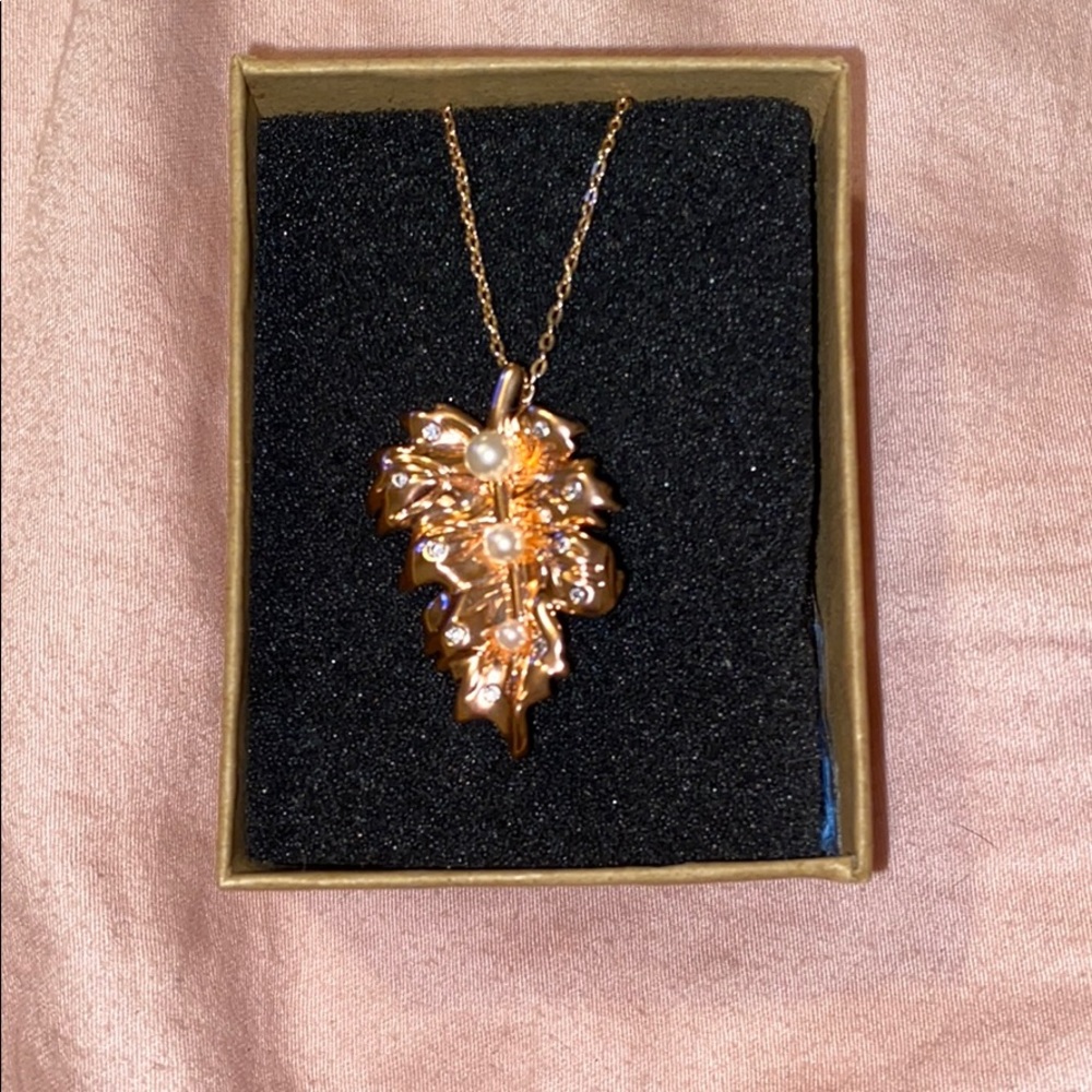gold leaf with pearl necklace